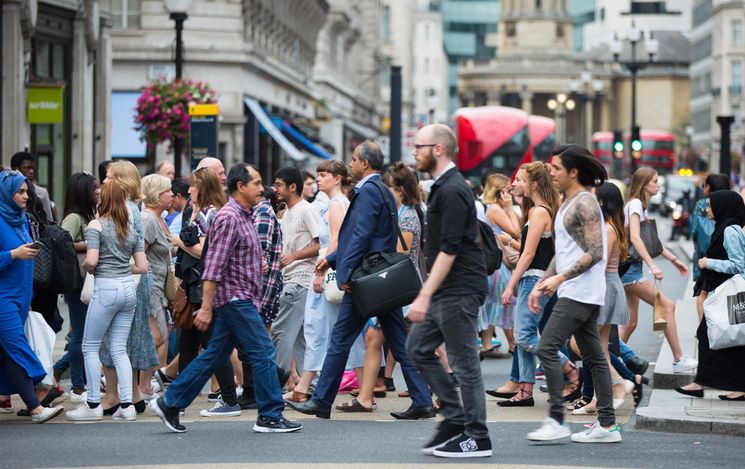 People crossing a busy London street